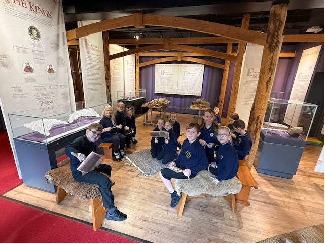 A photograph of Children from Ballacottier School enjoying Warp and Weft Workshops at the House of Manannan
