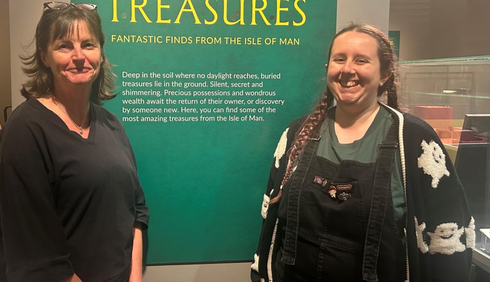 Allison Fox, Curator for Archaeology at Manx National Heritage and Sophie Crump, Assistant Collections Manager at the British Museum installing the exhibition