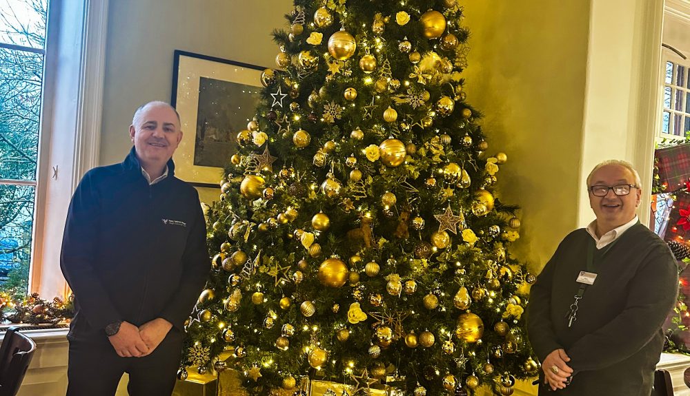 Manx National Heritage team members Brian Redfearn and Daniele Tortasso get into the festive spirit at the Manx Museum