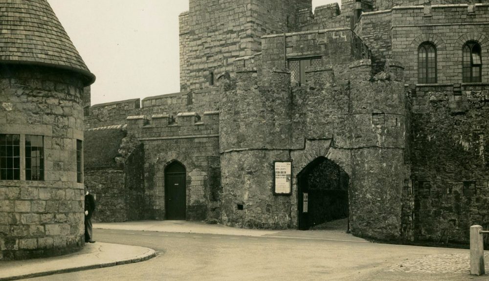 Black and white photograph of Entrance to Castle Rushen, showing part of the police station